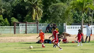 Enjoying a game of soccer, promoting teamwork and physical activity.